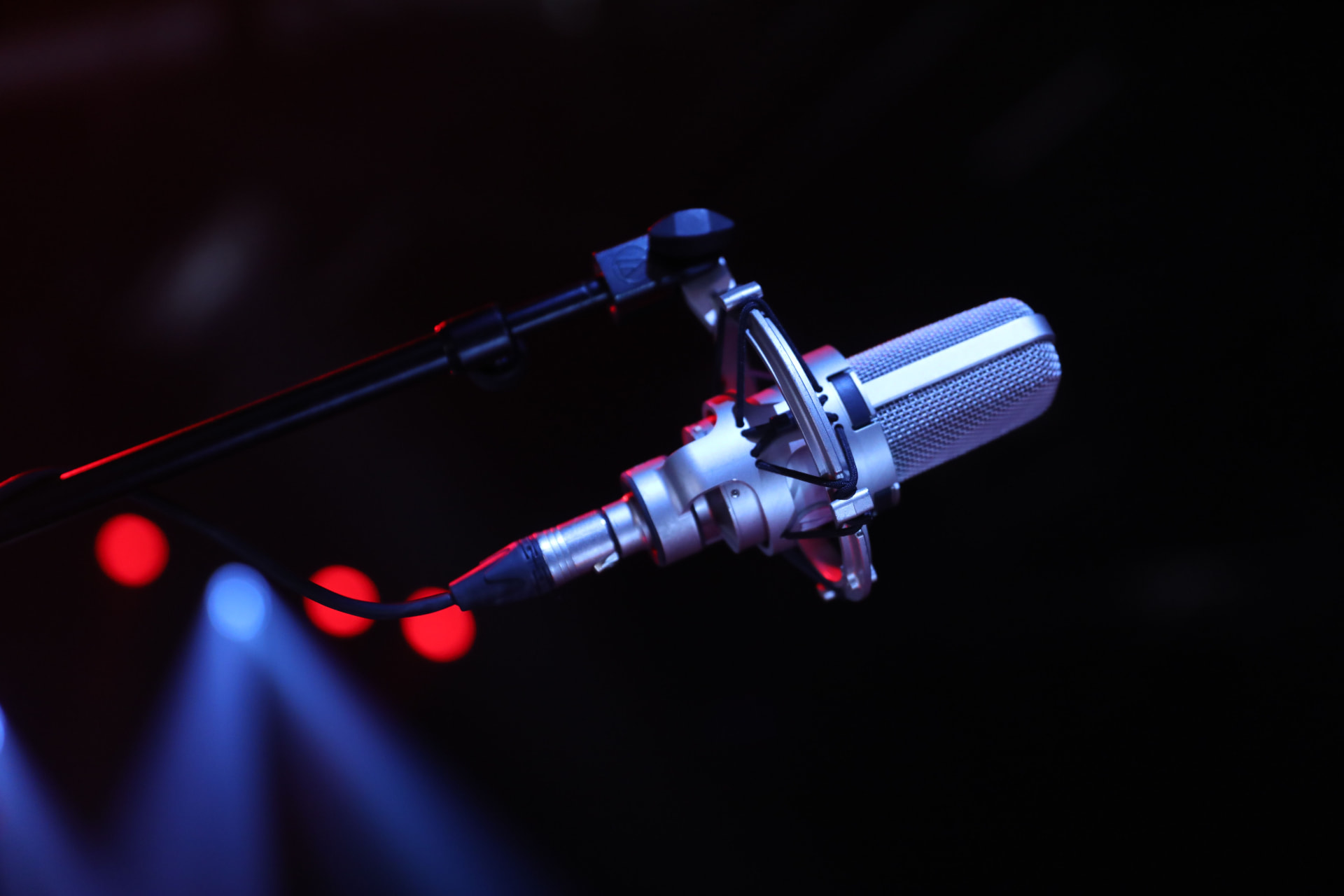 Publishing contract and split sheets beside a vintage microphone